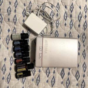 Doterra essential oil diffuser with assorted oils